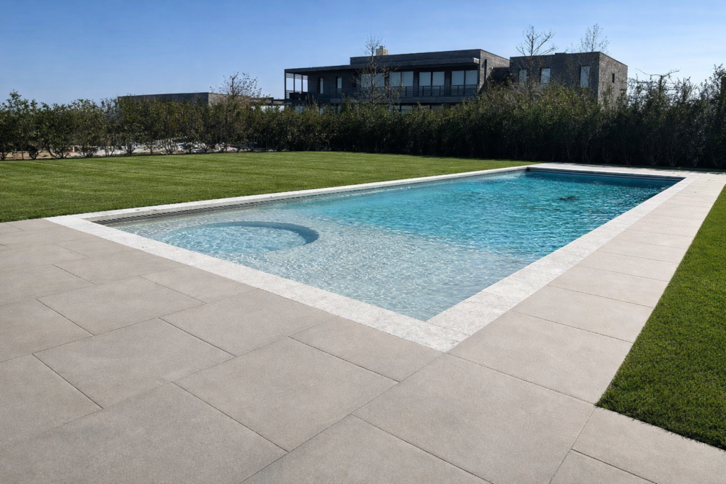 Professional pool builders installing custom concrete pool in New Jersey home